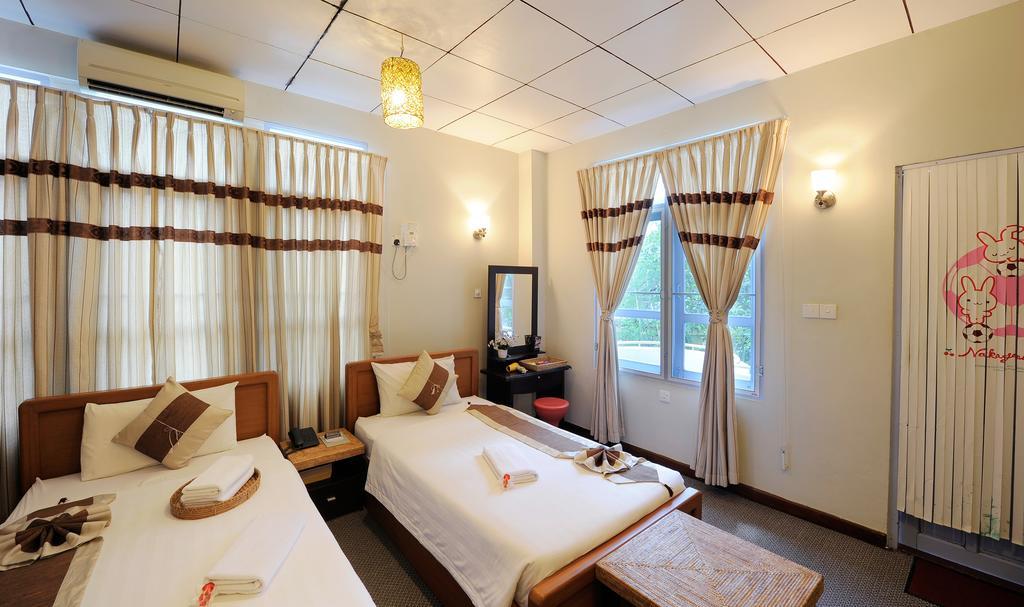 Cinderella Hotel Moulmein Quarto foto